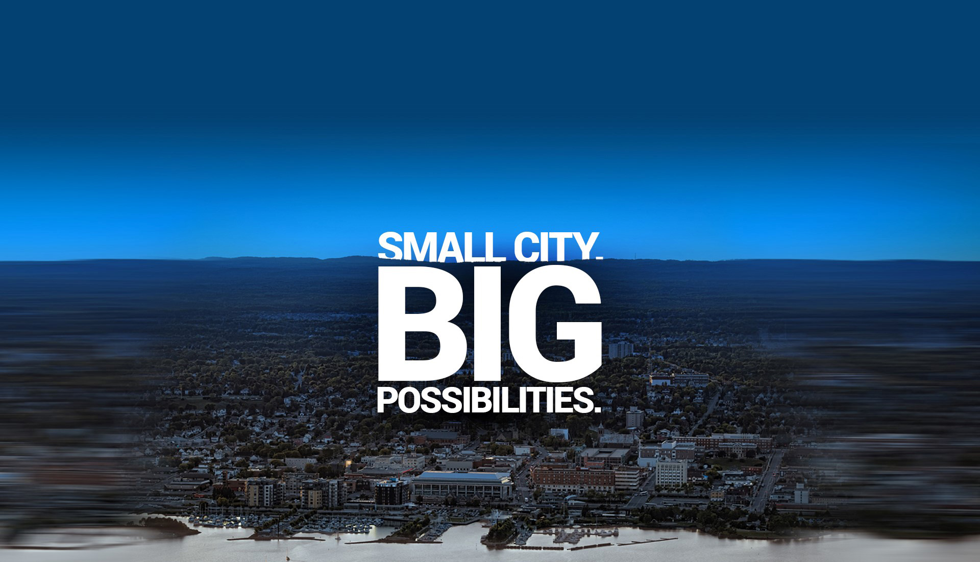 text: small city big possibles image: city of thunder bay