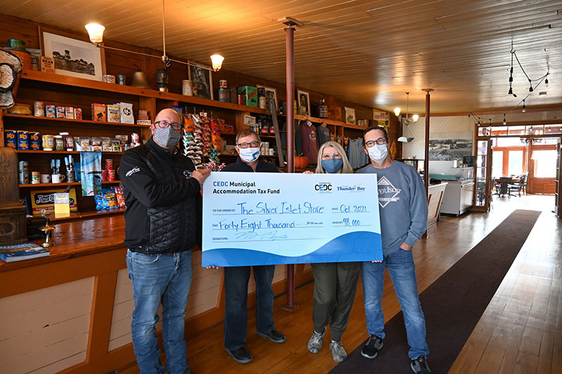 Cheque photo, people holding large cheque, cedc tourism