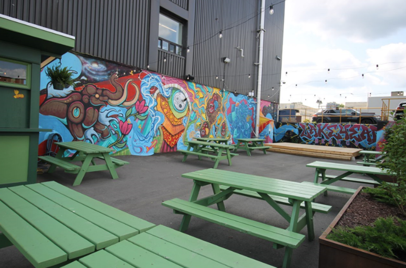 Lakehead Brewery summer patio - green picnic tables